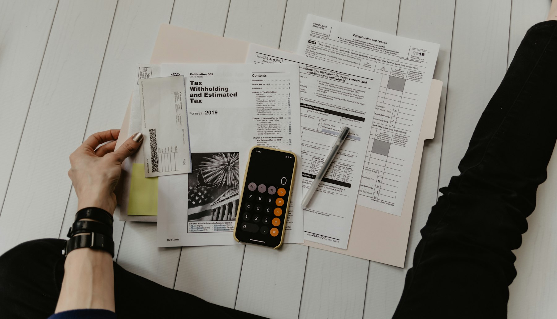 Reviewing financial documents and calculations